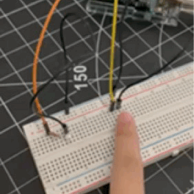 Using a button to activate the LED on the breadboard.